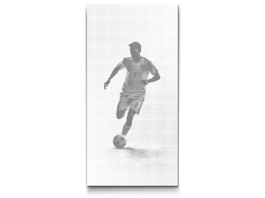 Fodboldspiller i Silhuet